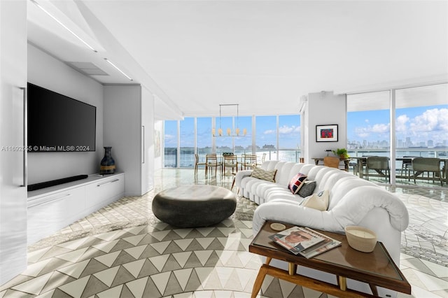 living room with floor to ceiling windows