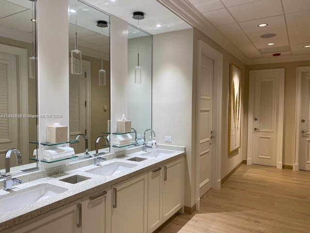 bathroom featuring hardwood / wood-style flooring and vanity