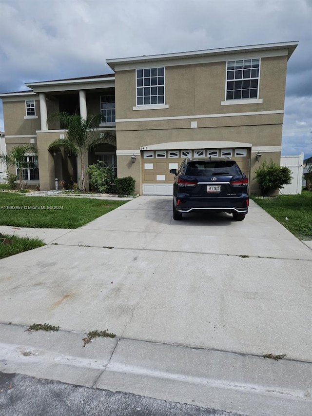 view of front of property with a garage