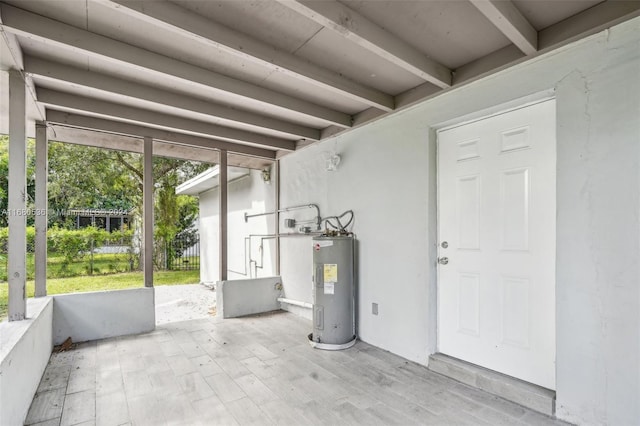 view of patio / terrace featuring electric water heater