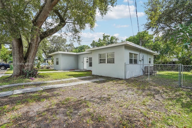 ranch-style house with a front yard