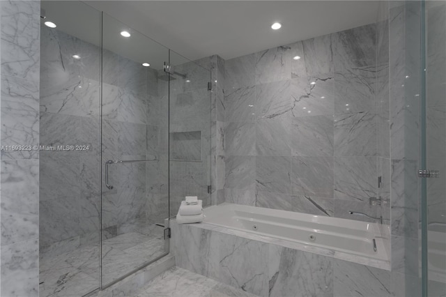 bathroom with independent shower and bath