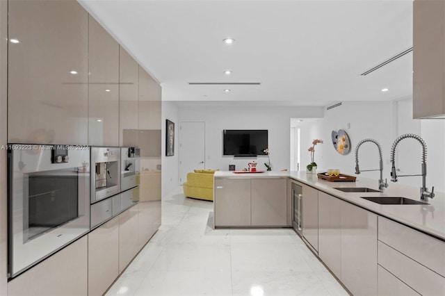 kitchen featuring sink and wine cooler