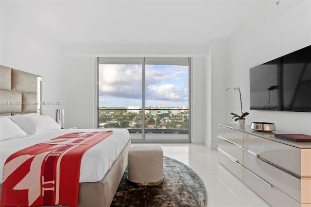 bedroom featuring multiple windows