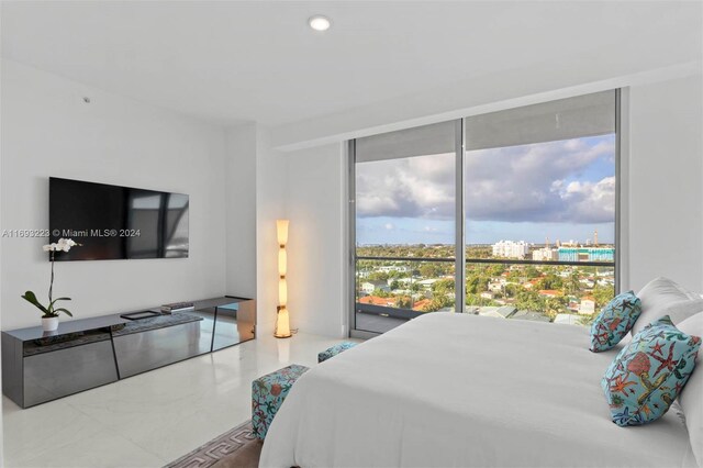 bedroom with expansive windows