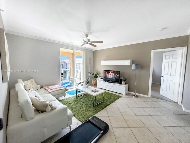 tiled living room with ceiling fan and crown molding