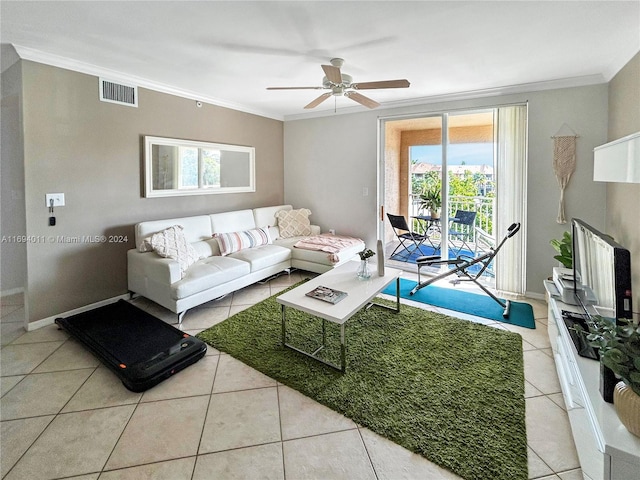 tiled living room featuring ceiling fan and ornamental molding