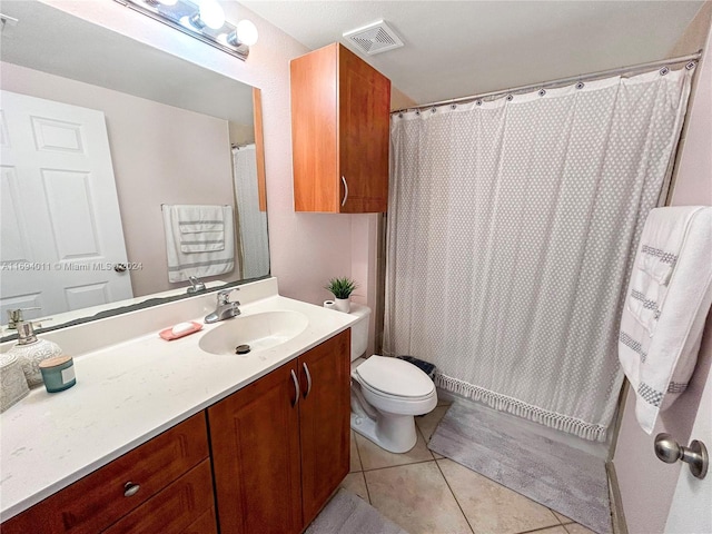 6458 Emerald Dunes Dr Unit 303, West Palm Beach, FL 33411 - bathroom with vanity, toilet, tile patterned flooring, and a shower with shower curtain