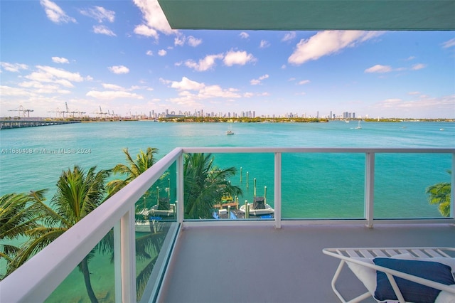 balcony featuring a water view