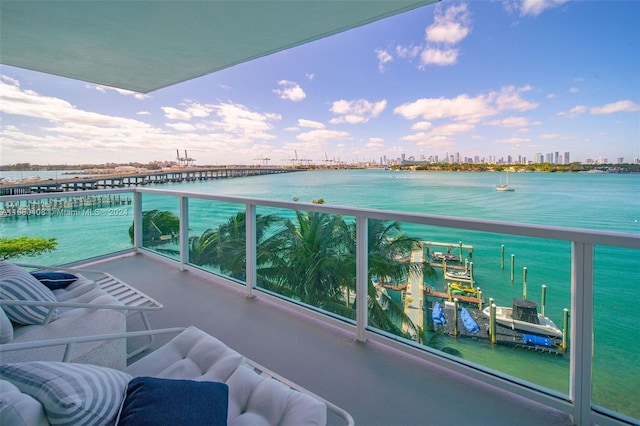 balcony featuring a water view