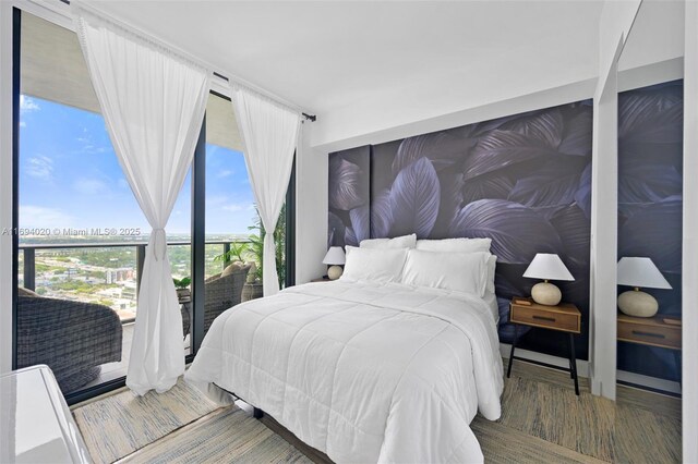 121 NE 34th St Unit 3014, Miami, FL 33137 - bedroom featuring floor to ceiling windows
