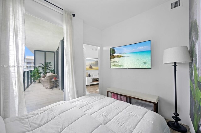 121 NE 34th St Unit 3014, Miami, FL 33137 - bedroom featuring wood finished floors