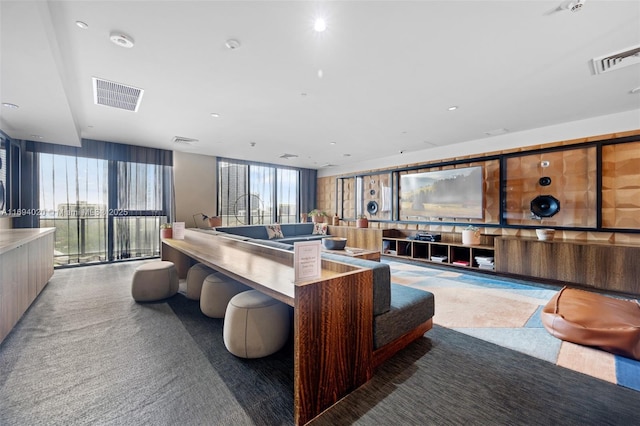 121 NE 34th St Unit 3014, Miami, FL 33137 - living area featuring carpet flooring and a wall of windows