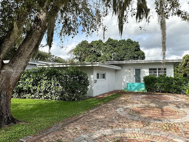 view of home's exterior with a yard