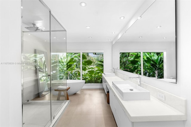 bathroom featuring vanity and plus walk in shower