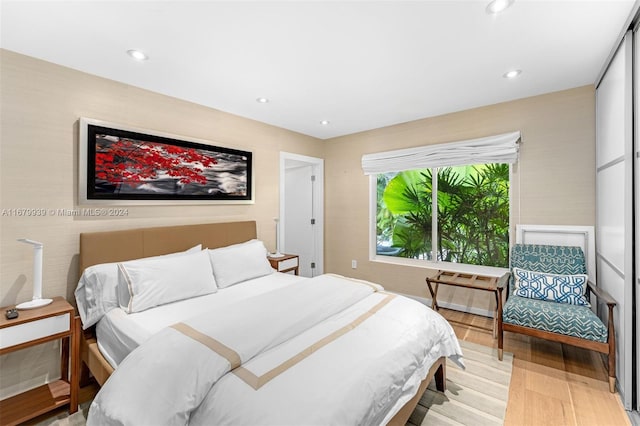 bedroom featuring light hardwood / wood-style flooring