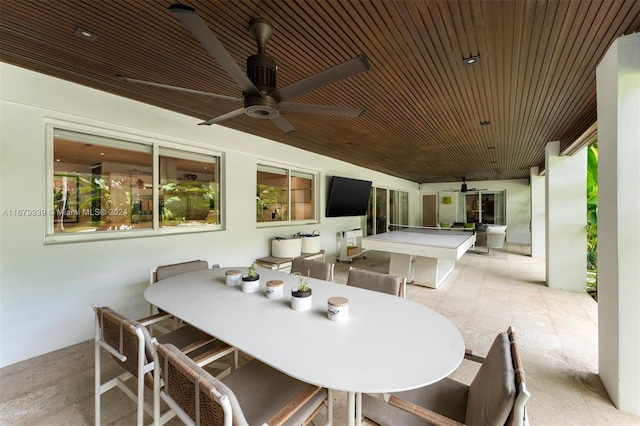 view of patio featuring ceiling fan