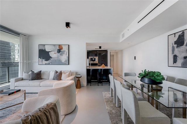 living room with concrete floors