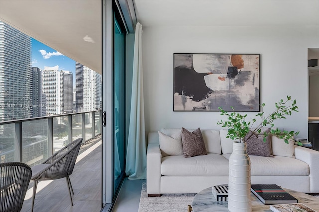 living room featuring floor to ceiling windows