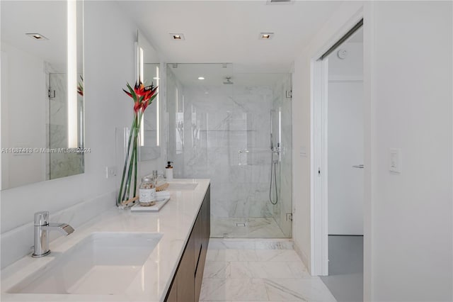 bathroom featuring vanity and walk in shower