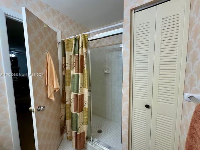 bathroom featuring curtained shower