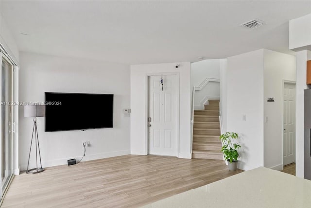 living room featuring light wood-type flooring