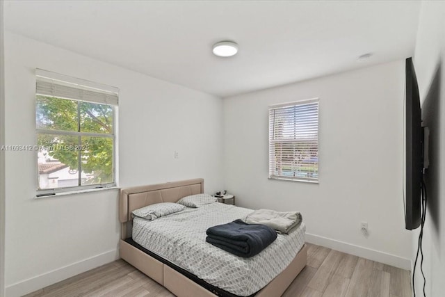 bedroom featuring light hardwood / wood-style floors