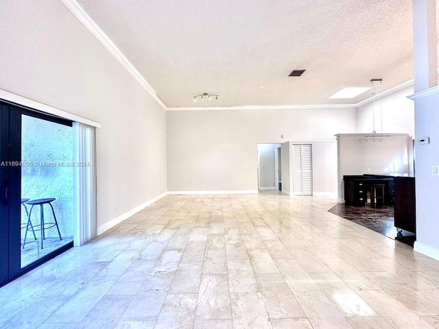 unfurnished living room featuring a textured ceiling and crown molding