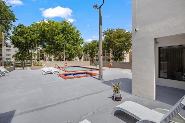 view of patio featuring a hot tub