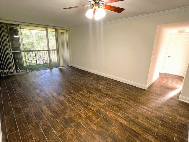 unfurnished room featuring ceiling fan, dark hardwood / wood-style floors, and ornamental molding