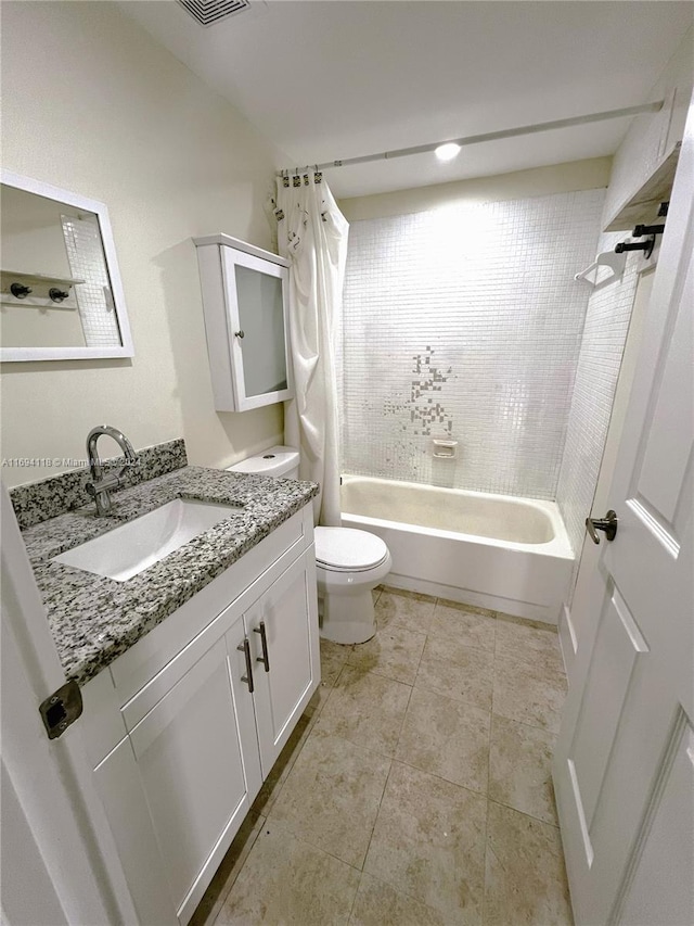 full bathroom with vanity, tile patterned flooring, shower / bathtub combination with curtain, and toilet