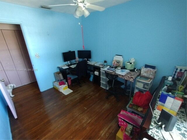 home office featuring ceiling fan and dark hardwood / wood-style floors