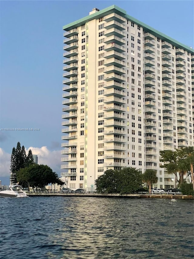 view of building exterior featuring a water view