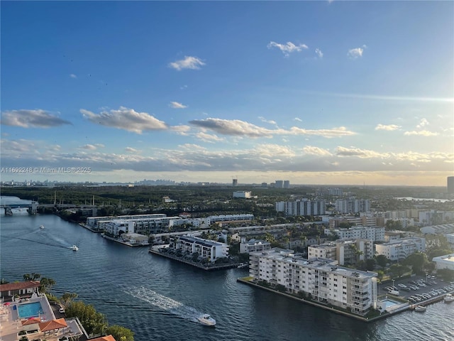 aerial view with a view of city and a water view