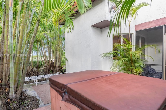 view of patio featuring a hot tub