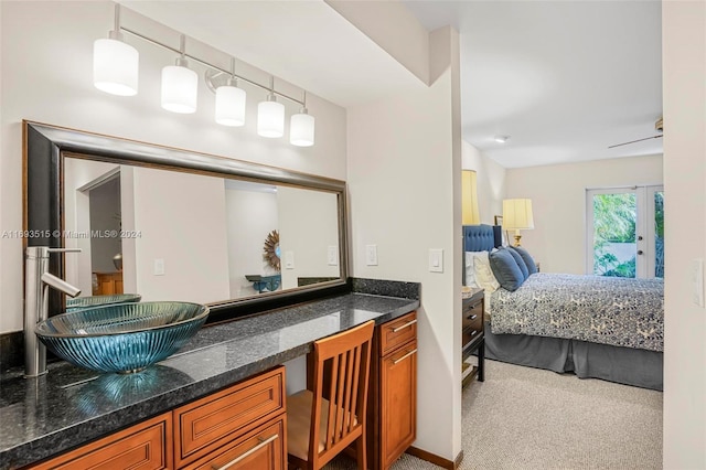 bedroom with light colored carpet