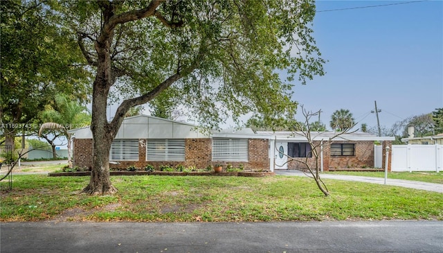 view of front of home with a front lawn