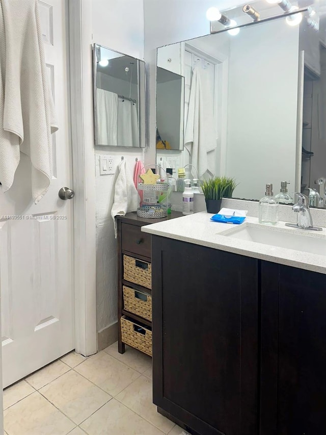 bathroom featuring vanity and tile patterned floors