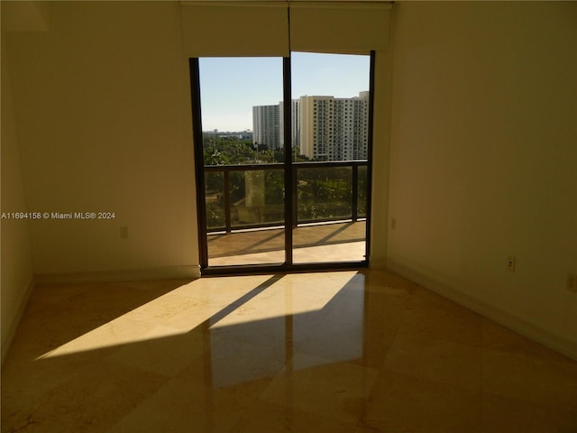 view of tiled empty room