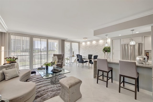 tiled living room featuring crown molding