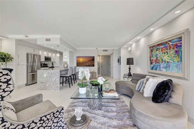 living room with ornamental molding