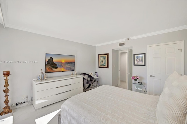 bedroom with crown molding