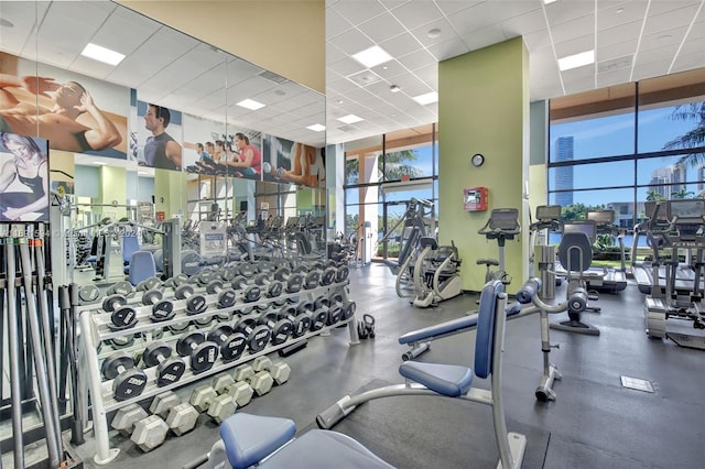 gym featuring a paneled ceiling