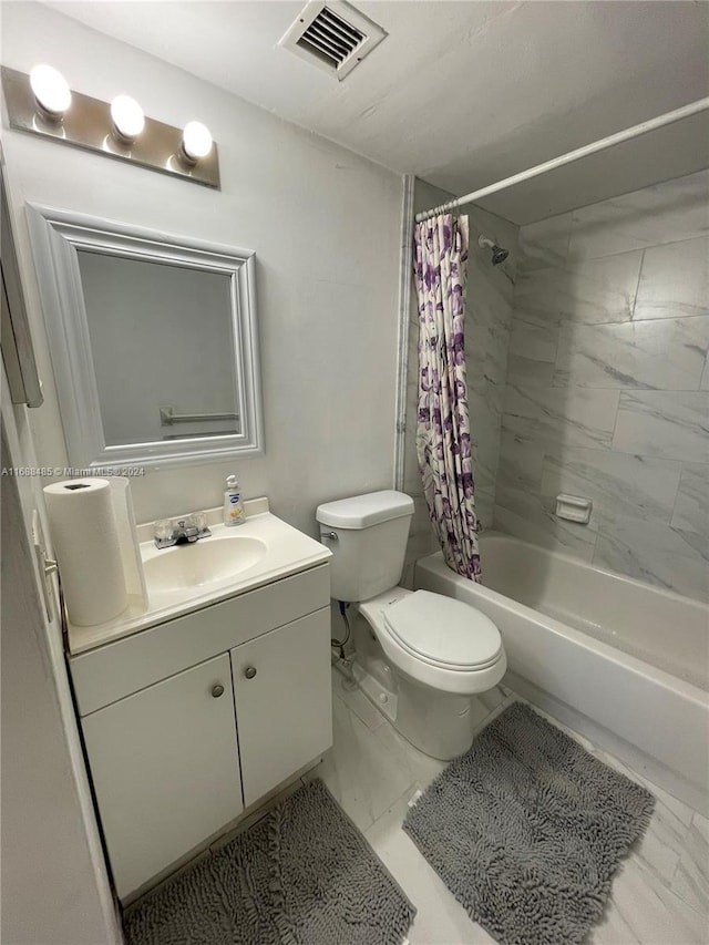 full bathroom with shower / bath combination with curtain, vanity, and toilet