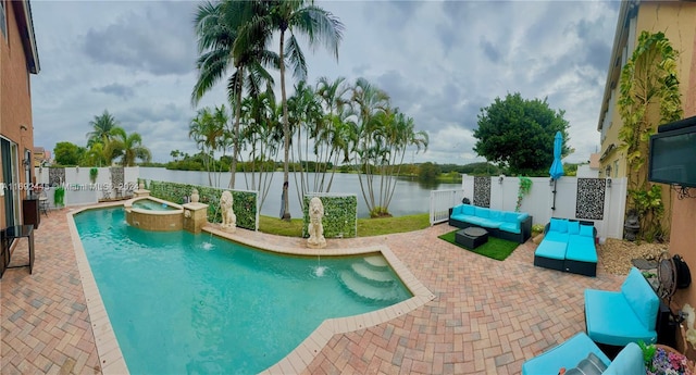 view of pool featuring an in ground hot tub, pool water feature, and a patio area