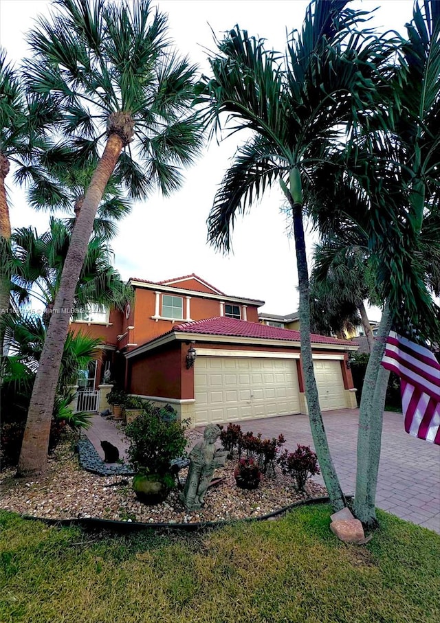 view of side of home featuring a garage