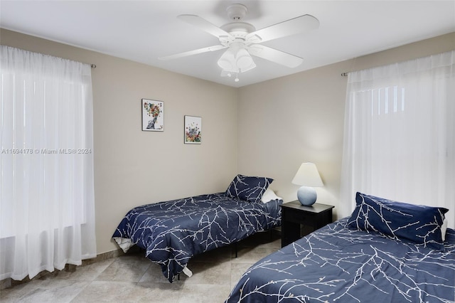 bedroom featuring ceiling fan