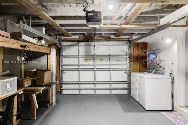 garage with independent washer and dryer and a garage door opener