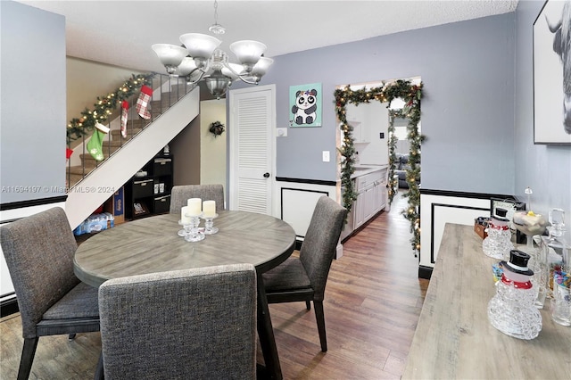 10710 La Placida Dr Unit 6-6, Coral Springs, FL 33065 - dining area featuring wood finished floors and a chandelier
