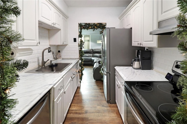 10710 La Placida Dr Unit 6-6, Coral Springs, FL 33065 - kitchen featuring stainless steel appliances, dark wood-type flooring, a sink, and tasteful backsplash